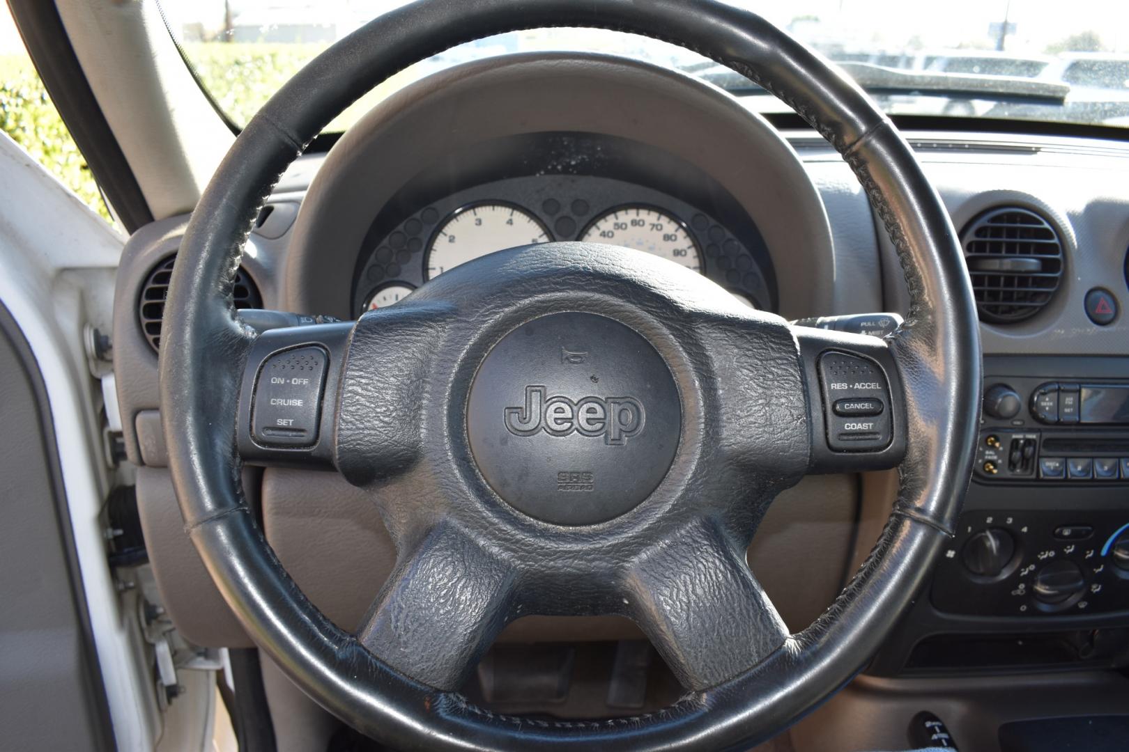 2004 White /Tan Jeep Liberty (1J4GL48K34W) , located at 5925 E. BELKNAP ST., HALTOM CITY, TX, 76117, (817) 834-4222, 32.803799, -97.259003 - Buying a 2004 Jeep Liberty can offer several benefits, depending on your needs and preferences: Off-road Capability: The Jeep Liberty is known for its off-road prowess, with features such as available four-wheel drive and a rugged design that can handle various terrains. If you enjoy outdoor activi - Photo#8